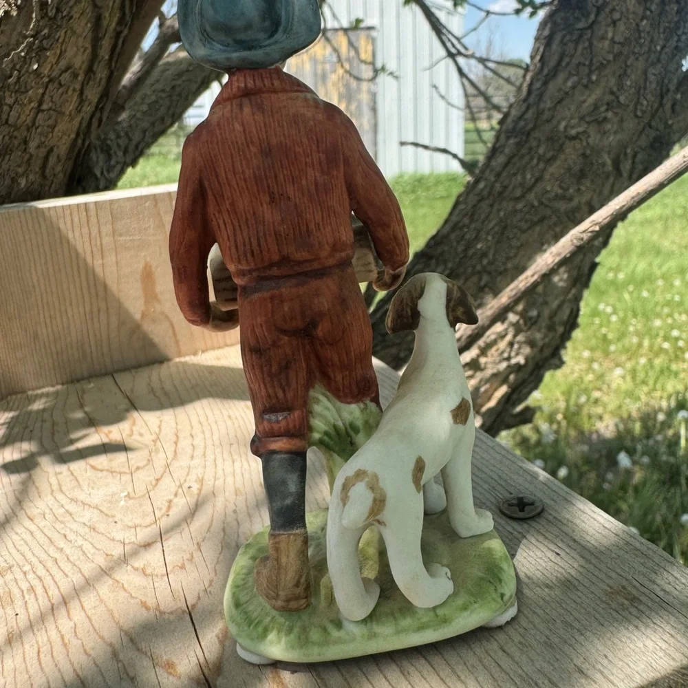 Norman Rockwell Puppy Love Figurine of Boy with Puppies